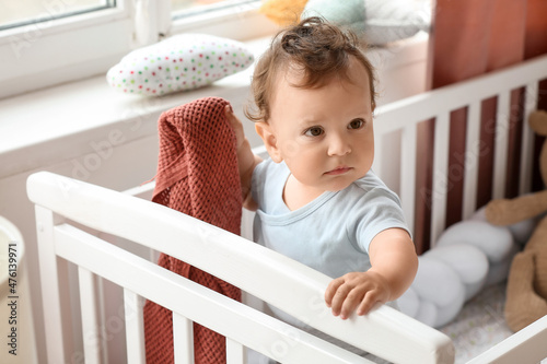 Cute little baby with plaid...