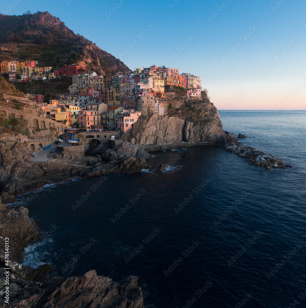 Image of view of Manarola city La Spezia during sunset time on top of the hill, Italy.