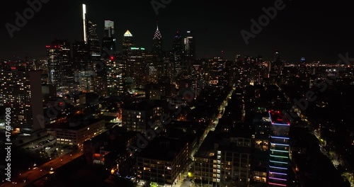 Wallpaper Mural Aerial establishing shot of downtown urban city skyscrapers at night. Dramatic beautiful lights against dark sky. Torontodigital.ca