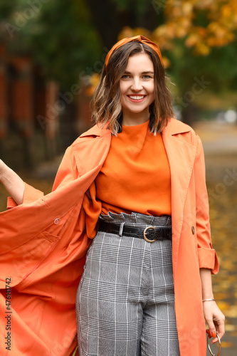 Happy fashionable woman on ...