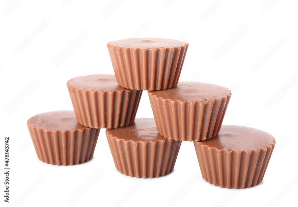 Tasty peanut butter cups on white background Tasty peanut butter cups on white background