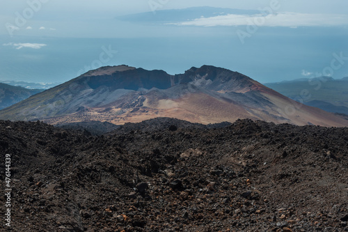 View of a volcano and it's crater from the peak of Mount Teide - Santa Cruz de Tenerife, Canary Islands, Spain