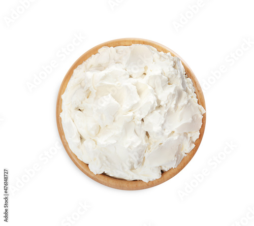Wooden bowl of tasty cream cheese isolated on white, top view