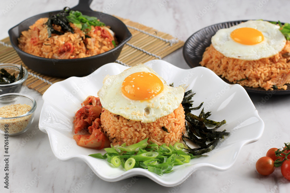 Bokkeumbap or Kimchi Fried Rice, South Korea Traditional Recipe Fried Rice with Kimchi, Spring Onion, Sesame Seed,  Mushroom, and Nori (Laver), Copy Space, Top View