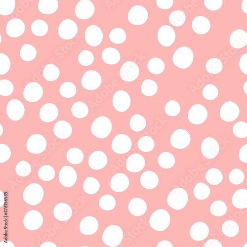 Childish seamless pattern, pastel colors. Hand drawn white dots on a pink background. Vector geometric backgrounds.