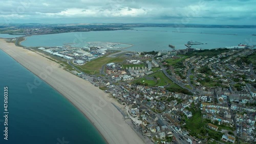 Chesil Beach and Fleet Lagoon on the Isle of Portland looking towards Weymouth in Dorset. photo