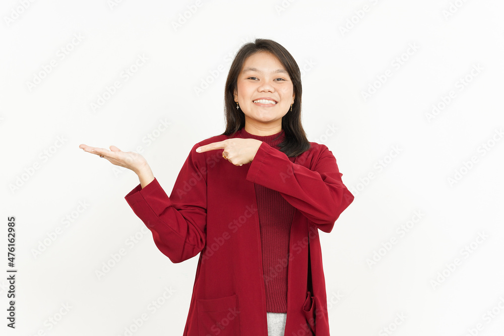 Showing recommended product on open palm Of Beautiful Asian Woman Wearing Red Shirt Isolated On White Background Showing recommended product on open palm Of Beautiful Asian Woman Wearing Red Shirt Isolated On White Background