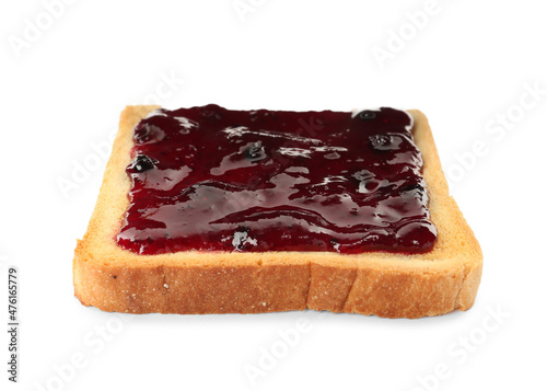 Toast with tasty blueberry jam on white background