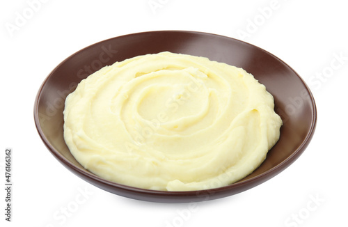 Plate with freshly cooked homemade mashed potatoes isolated on white