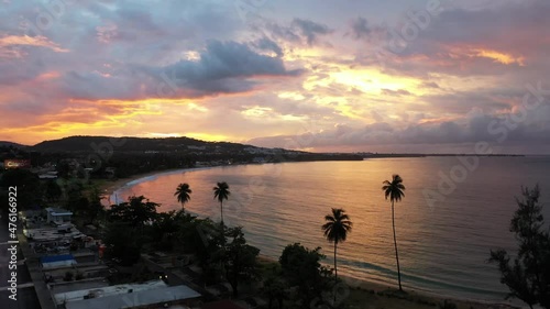 A scenic sunset at the beach of Luquillo in Puerto Rico - shot in 4K photo