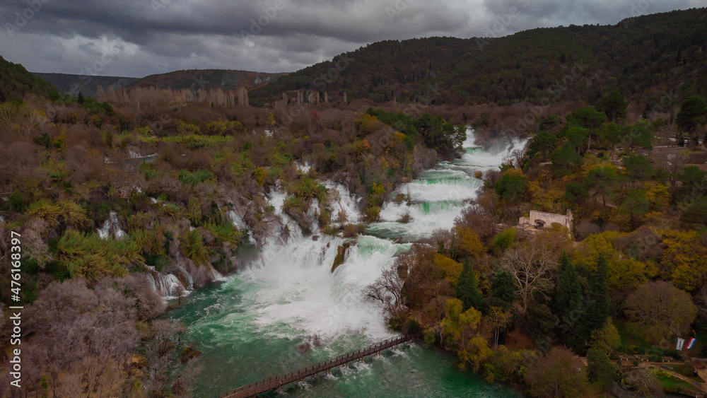 Beautiful Krka waterfalls at Skradinski buk viewed from air with a drone in cold winter setting. No people visible around.