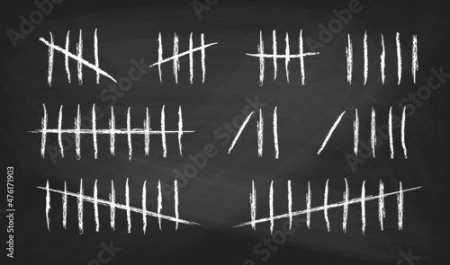 Tally marks set on school black chalkboard. Collection of white hash marks signs of prison wall, jail or desert island lost day tally numbers counting. Vector chalk drawn sticks lines counter