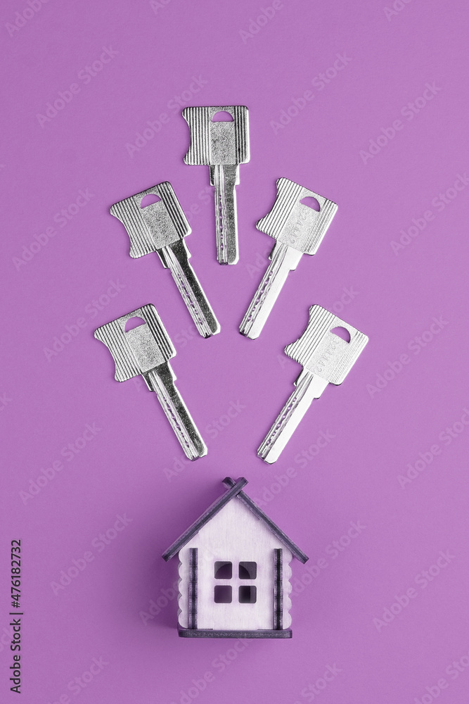 Conceptual composition: House keys and house model. Top view, flat lay. Real estate purchase concept. Conceptual composition: House keys and house model. Top view, flat lay. Real estate purchase concept.