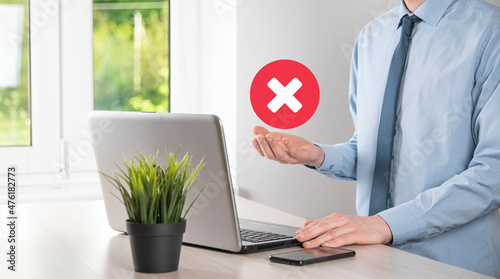Hand holds icon,cancellation symbol,cancel icon.Cross mark flat red icon.round X mark.cancel button.Wrong.cross mark rejection.Declined.On dark background.Banner.Copy space.Place for text.
