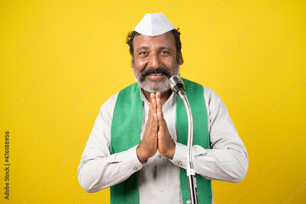 farmer indian politician greeting ato people in front of microphone during elections - concept of showing political strategy, lawmaker poll campaign and farmer supporter. - obrazy, fototapety, plakaty 