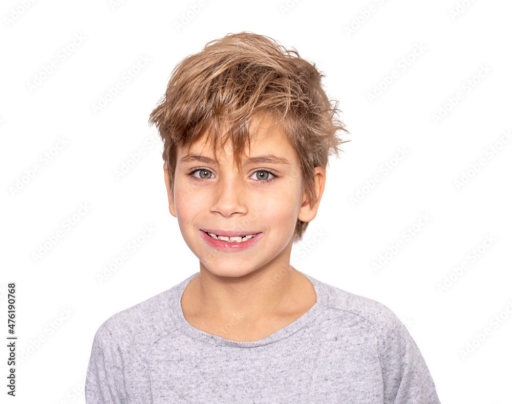 cute boy with blonde hair smiles isolated on white