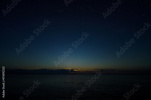 Twilight sky with stars at the lake.