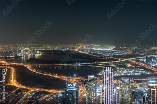Dubai, United Arab Emirates – December 14, 2021, the Arial skyline view of Dubai city at night from at the top of Burj Khalifa at night