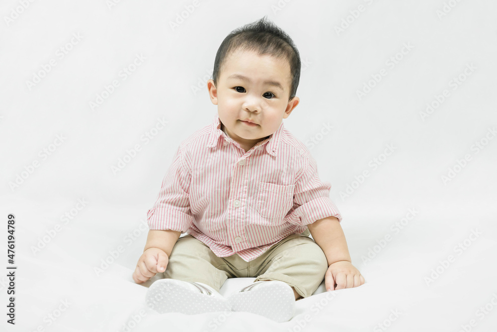 Stylish fashionable kid. Toddler baby boy model in casual clothes.Adorable asian Stylish fashionable kid. Toddler baby boy model in casual clothes.Adorable asian