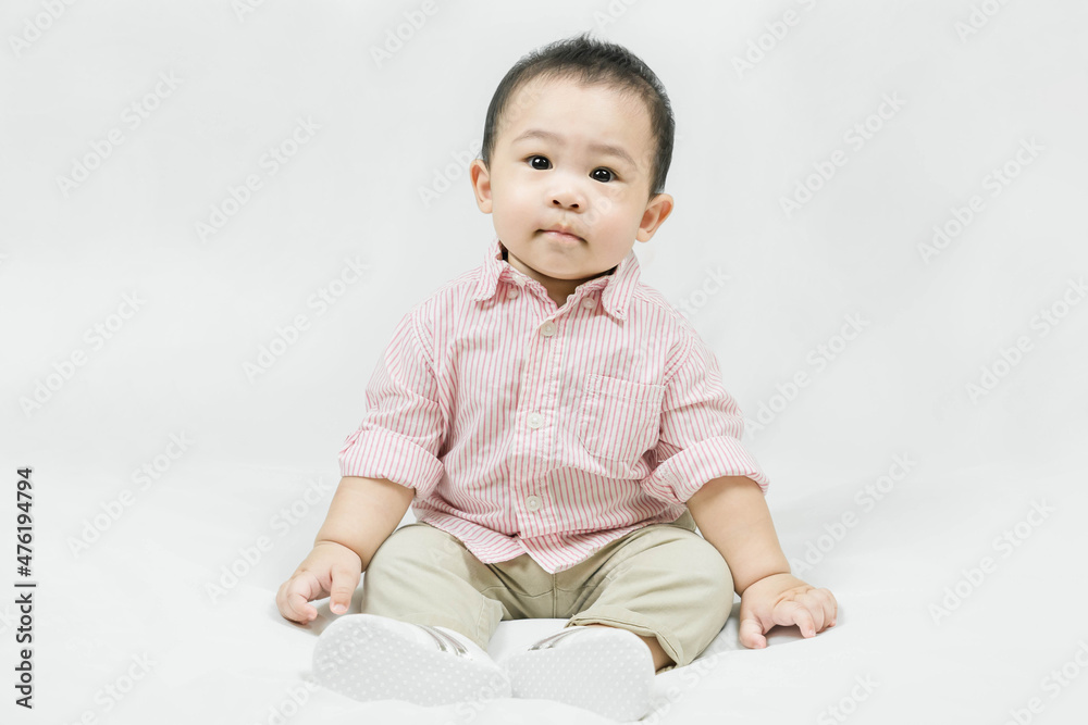 Stylish fashionable kid. Toddler baby boy model in casual clothes.Adorable asian Stylish fashionable kid. Toddler baby boy model in casual clothes.Adorable asian