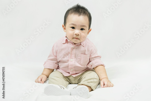 Stylish fashionable kid. Toddler baby boy model in casual clothes.Adorable asian