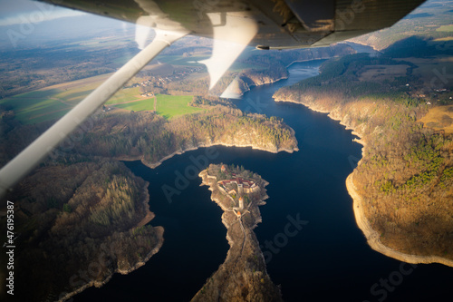 Beautiful aerial view of countryside during private sightseeing flight. Aerial view of Zvikov castle, Czechia. Zvikov castle at the junction of the Vltava and Otava rivers, South Bohemian Region photo