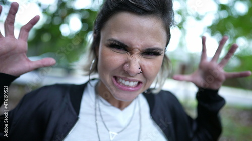 фотография Woman grimacing making funny face, funny goofy person