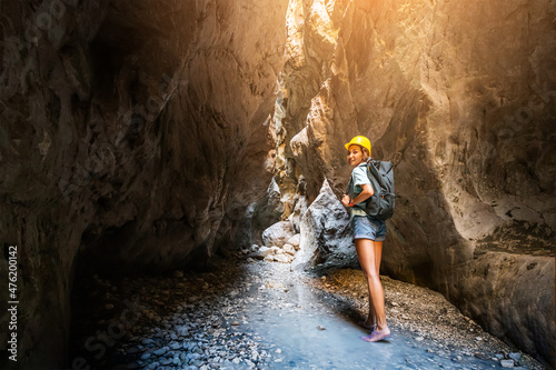 Φωτογραφία Happy alone woman wearing helmet for safety is engaged in active canyoning and hiking along the Saklikent Gorge in Turkey