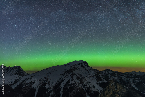 Beautiful green aurora dancing over Mt. Borgeau, Banff, Canada