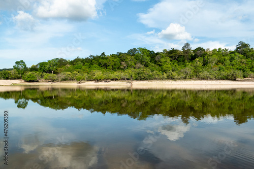 Reflections in water. Landscape in the Tapajos River, Brazilian Amazon. photo