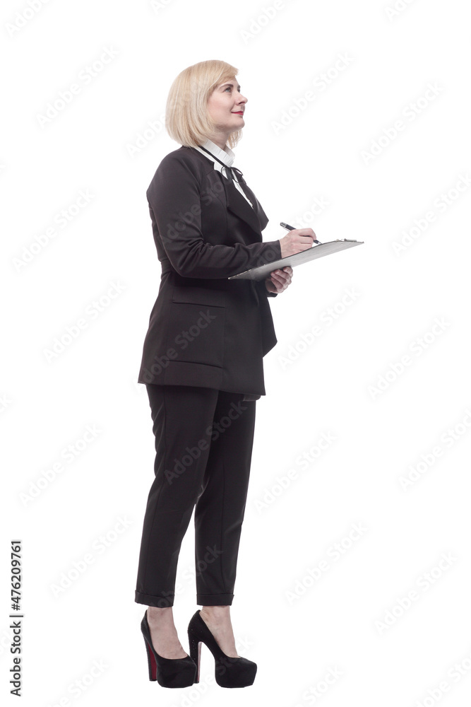 in full growth. confident business woman with a clipboard.