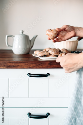 Ginger coockies on wooden table. Cozy home cooking. Home baking.