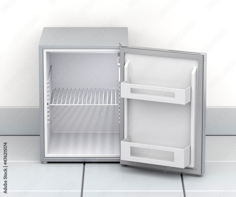 Empty small refrigerator in the kitchen Empty small refrigerator in the kitchen