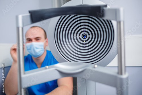 Microscopic apparatus for testing eyesight. Ophthalmology and treatment of eye diseases. Eye clinic, optometrist concept