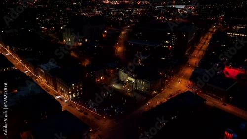 City Of Sherbrooke Illuminated With Lights During Nighttime In Canada - aerial pullback photo