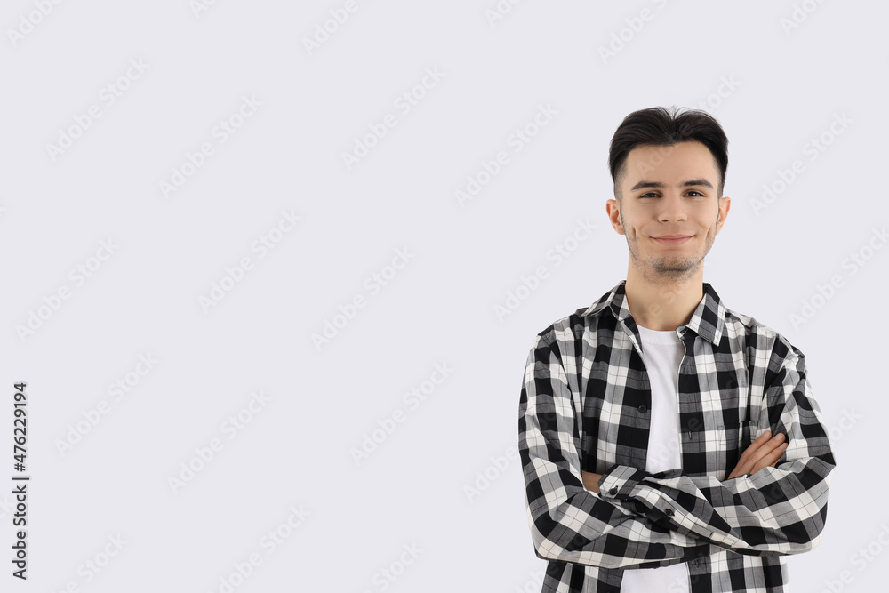 Attractive guy in shirt on white background Attractive guy in shirt on white background
