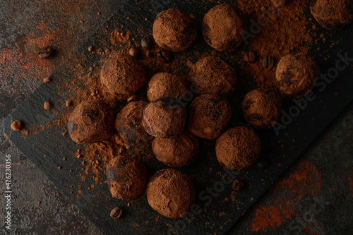 Concept of sweets with truffles on dark textured background © Atlas