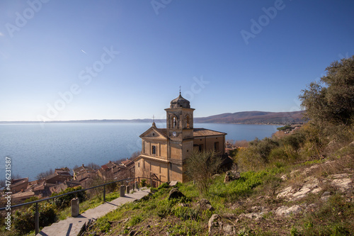 Church of the Assumption of Mary in panoramic views ,built around 1500 with The square bell tower.Trevignano Romano,Italy
