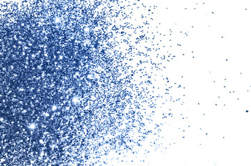 Textured background with blue glitter sparkle on white
