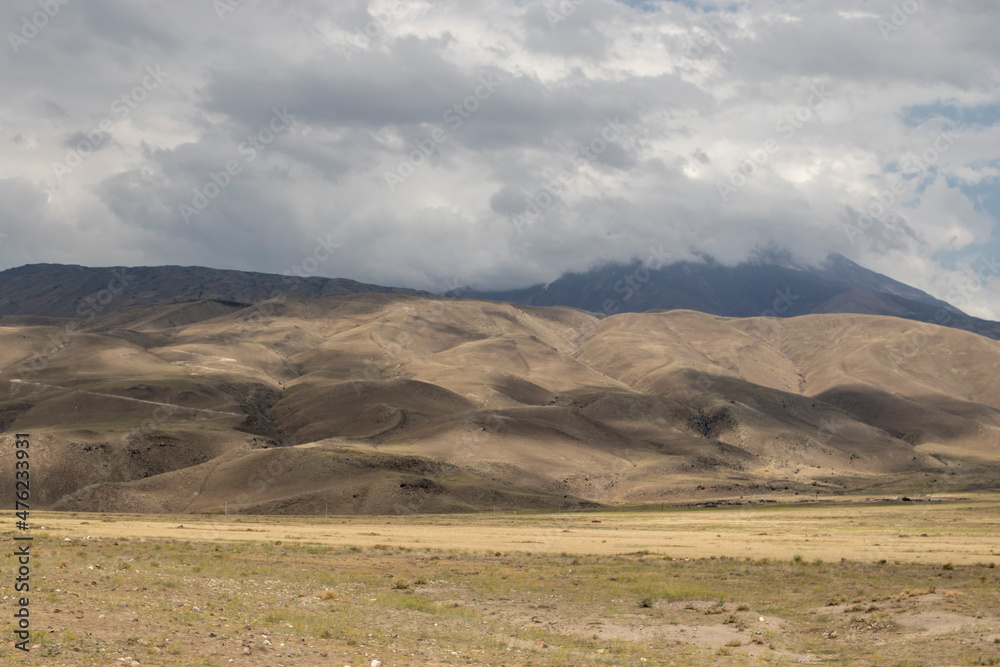 landscape with mountains and clouds landscape with mountains and clouds