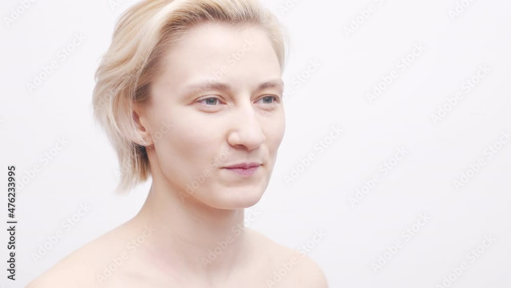 Adult Female Placing Mouth Guard on Teeth. Dental Protection Concept, Close Up, Studio Shot on White Background Adult Female Placing Mouth Guard on Teeth. Dental Protection Concept, Close Up, Studio Shot on White Background