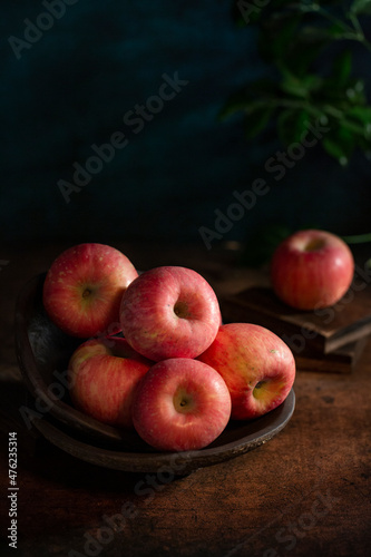 Fresh apples on the  wooden table