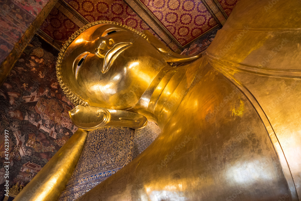 Bangkok, Thailand, November 2017 - view of the Golden Reclined Buddha statue at Wat Pho