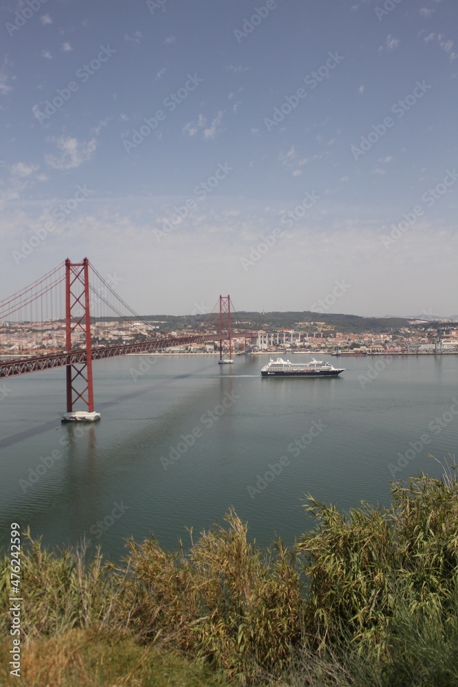 Fototapeta premium 25th of April Suspension Bridge over the Tejo river in Lisbon, Portugal
