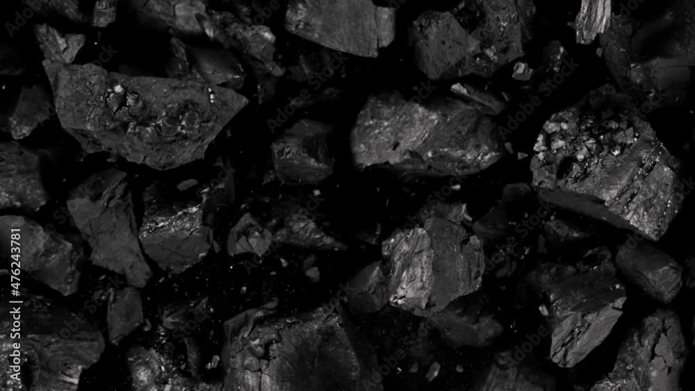 Super Slow Motion Shot of Coal Explosion Isolated On Black Background at 1000 fps.