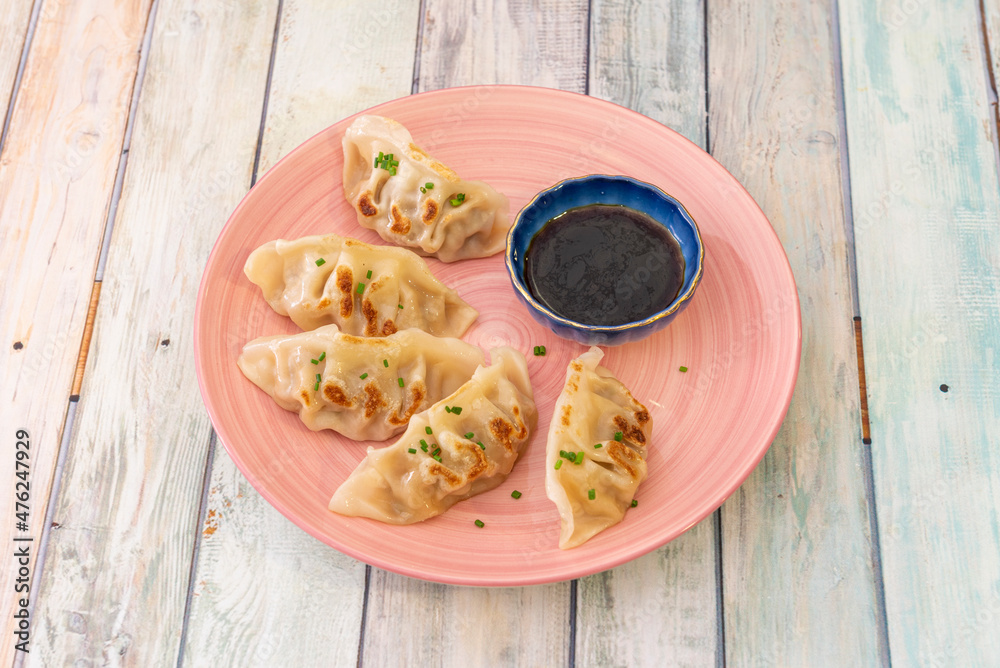 Gyoza, also known as yaki gyoza, are Japanese dumplings similar to the
