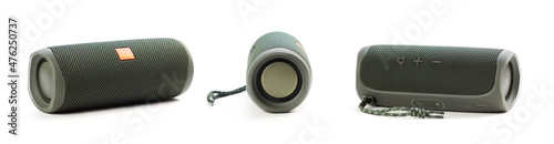 Portable wireless speaker from different sides. Close up. Isolated on a white background