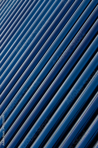 View of Solar panel tubes in a line as abstract patterns and background 