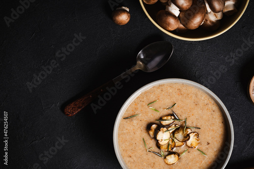 Mushroom cream soup in ceramic bowl