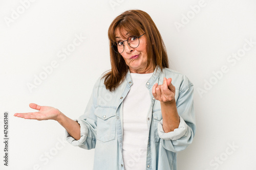 Middle age caucasian woman isolated on white background showing that she has no money.